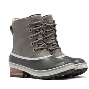 Black and gray size 7 Sorel rain boots - work out of the house once.